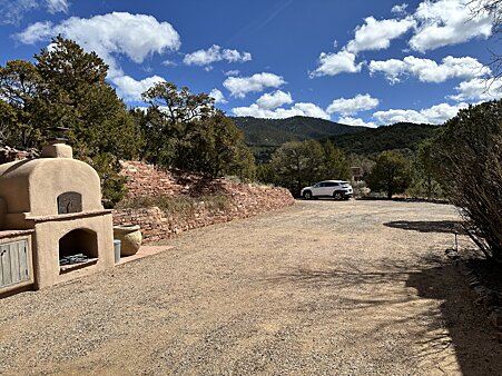 PARKING AREA AND PIZZA OVEN