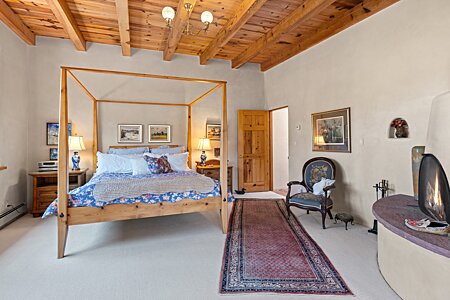 Primary Suite, Kiva Fireplace, Beams, Views to the Right of Bed