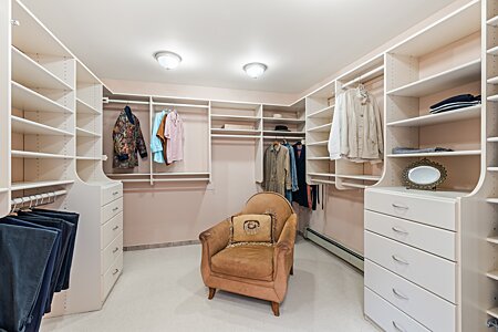 Primary Suite Spacious His and Hers Walk In Closet