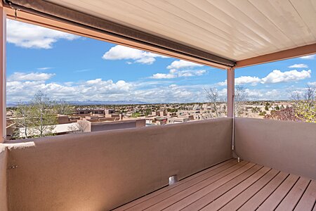 Viewing deck off of primary bedroom upstairs looking North-West to the Jemez Mountain range