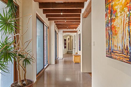 Hallway with Art Walls Leading to Guest Wing