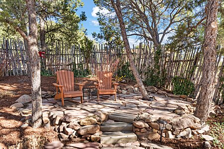 Flagstone Sitting Area in the shade of Piñon Trees