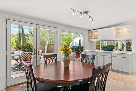 Dining Area with French Doors to Back Yard and ample storage