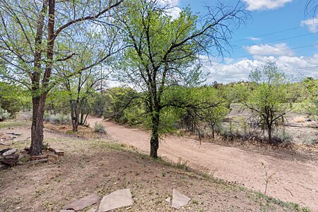 Arroyo bordering the property – walk to downtown!