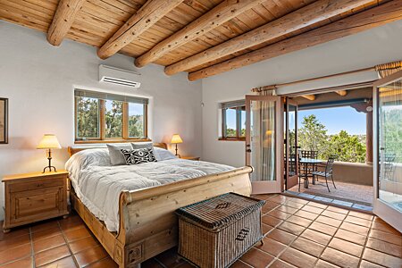 In the main bedroom, Wake up to expanses of green hillsides, distant mountain peaks, endless skies and a beautiful nurturing room