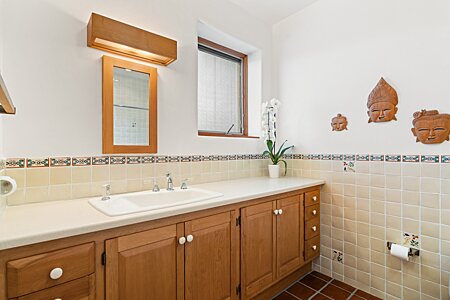 Light and bright, and Plenty of counter space in the 4th Guest bathroom