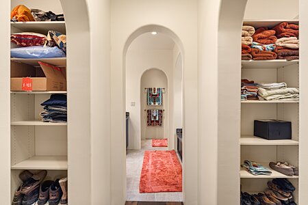 Beautiful Arched Hallway to Primary Closests And Bath Area