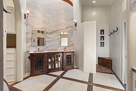 Master Bath Vanity with double sinks & Venetian Plaster to the wall-wash skylight