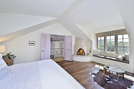 Primary Bedroom with Kiva Fireplace