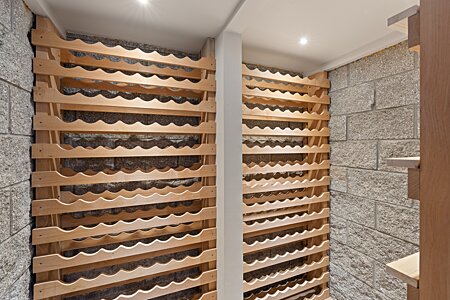 Wine storage in the downstairs area w/ room for at least 220 bottles