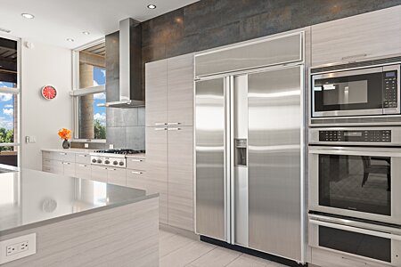 From Left - Thermador Gas Range top, 4-foot SubZero refrigerator + Microwave + Wall Oven + Waming Drawer