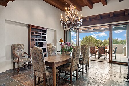 Experience the trees and the sky in the dining room with the disappearing glass doors