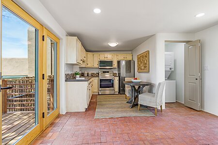 Looking towards Kitchen and Laundry Closet