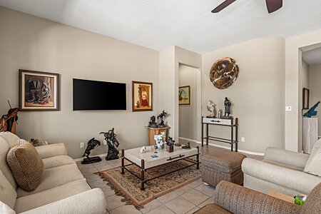 Open living room with tile flooring