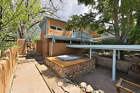 Hot tub and covered bonco and fireplace