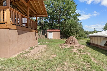 Main house porch on the upper lot, with old Horno