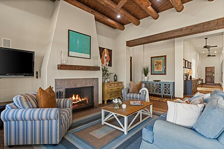 Living Room with wood-burning fireplace & TV space on the left