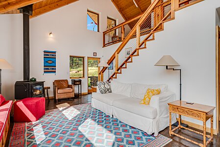 Living Room & Access to Upstairs Bedroom & Bathroom