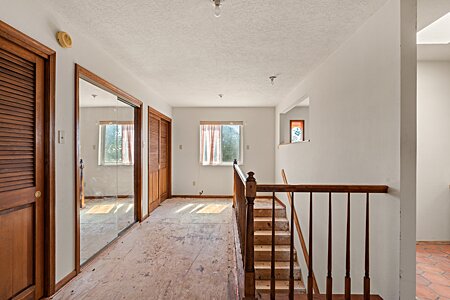 Hall to Upstairs Primary Bedroom