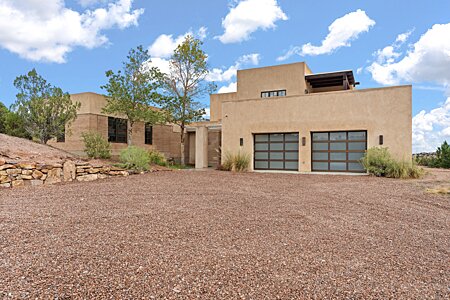 Stylish, Southwest , Contemporary Architecture privately set on a Tesuque knoll