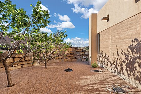 A secret, private courtyard off the kitchen -- fresh air, sky, birdsong...do an herb garden! 