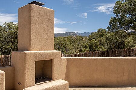 Enjoy the natural surroundings with fire in this great fireplace!